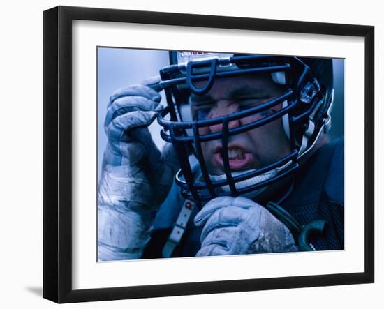 Close-up of an American Football Player Wearing a Helmet-null-Framed Photographic Print