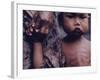 Close-Up of an Indonesian Child Holding on to the Hand of His Mother-Co Rentmeester-Framed Photographic Print