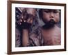 Close-Up of an Indonesian Child Holding on to the Hand of His Mother-Co Rentmeester-Framed Photographic Print