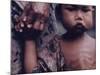 Close-Up of an Indonesian Child Holding on to the Hand of His Mother-Co Rentmeester-Mounted Photographic Print