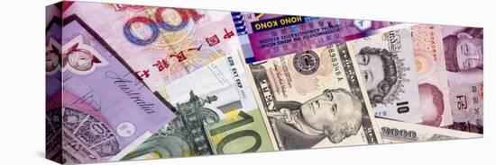 Close-Up of Assorted Currencies of Different Countries-null-Stretched Canvas