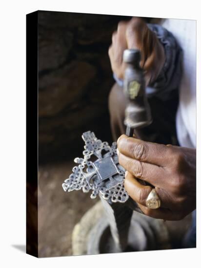 Close-Up of Blacksmith's Hands Working on Metal Cross, Axoum (Axum) (Aksum), Tigre Region, Ethiopia-Bruno Barbier-Stretched Canvas