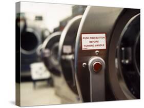 Close-up of Dryer Handle in a Laundromat-null-Stretched Canvas