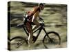 Close up of Fast Moving Mountain Biker, Mt. Bike-Michael Brown-Stretched Canvas