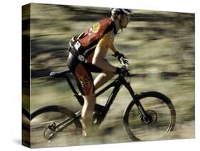 Close up of Fast Moving Mountain Biker, Mt. Bike-Michael Brown-Stretched Canvas