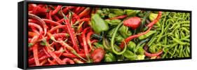 Close-Up of Green and Red Chili Peppers at Market Stall-null-Framed Stretched Canvas