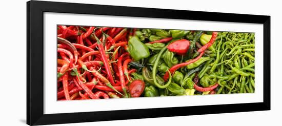 Close-Up of Green and Red Chili Peppers at Market Stall-null-Framed Photographic Print