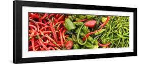 Close-Up of Green and Red Chili Peppers at Market Stall-null-Framed Photographic Print