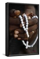 Close-up of hands of African Muslim man praying with Islamic prayer beads (tasbih), Togo-Godong-Framed Photographic Print