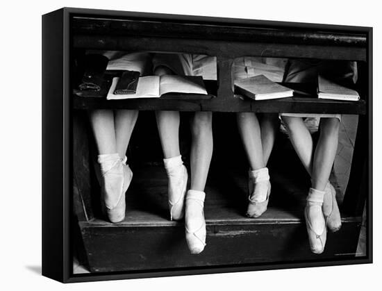 Close Up of Legs of Young Ballerinas in Toe Shoes under Desk at La Scala Ballet School-Alfred Eisenstaedt-Framed Stretched Canvas