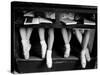 Close Up of Legs of Young Ballerinas in Toe Shoes under Desk at La Scala Ballet School-Alfred Eisenstaedt-Stretched Canvas