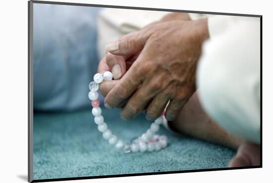 Close-up of man praying in a mosque with Tasbih (prayer beads), Masjid Al Rahim Mosque-Godong-Mounted Photographic Print