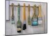 Close-up of paint brushes hanging on wall at an artist studio, California, USA-Panoramic Images-Mounted Photographic Print