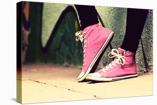 Close up of Pink Sneakers Worn by a Teenager. Grunge Graffiti Wall, Concepts of Teen Rebel, Problem-Michal Bednarek-Stretched Canvas