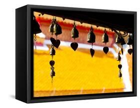 Close Up of Prayer Bells Silhouetted Against Colourful Roof at Wat Doi Suthep, Chiang Mai, Thailand-Matthew Williams-Ellis-Framed Stretched Canvas