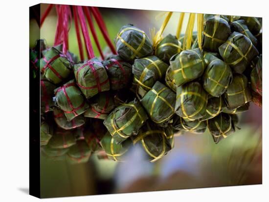 Close Up of Rice Balls Wrapped in Vine Leaves, Vietnam-Paul Harris-Stretched Canvas