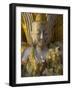 Close up of Small Buddha Figure with Flowers Round the Neck in the Shwedagon Paya, Yangon, Myanmar-Eitan Simanor-Framed Photographic Print