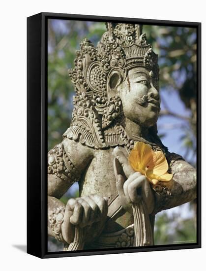 Close-up of Statue, Bali, Indonesia, Southeast Asia, Asia-Claire Leimbach-Framed Stretched Canvas