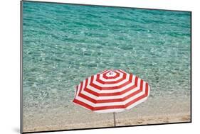 Close up of Striped Beach Umbrella near Sea, San Vito Lo Capo, Sicily, Italy-Massimo Borchi-Mounted Giclee Print