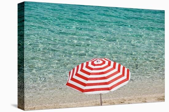 Close up of Striped Beach Umbrella near Sea, San Vito Lo Capo, Sicily, Italy-Massimo Borchi-Stretched Canvas