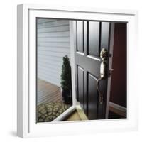 Close-up of the Front Door of a House Left Ajar-null-Framed Photographic Print