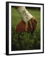 Close-up of the Hand of an American Football Player Holding a Football-null-Framed Premium Photographic Print