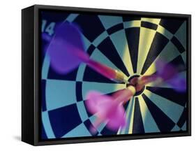 Close-up of Three Darts in the Bull's-Eye of a Dartboard-null-Framed Stretched Canvas