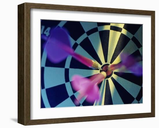 Close-up of Three Darts in the Bull's-Eye of a Dartboard-null-Framed Premium Photographic Print