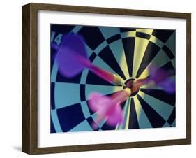 Close-up of Three Darts in the Bull's-Eye of a Dartboard-null-Framed Premium Photographic Print