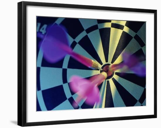 Close-up of Three Darts in the Bull's-Eye of a Dartboard-null-Framed Photographic Print