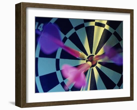 Close-up of Three Darts in the Bull's-Eye of a Dartboard-null-Framed Photographic Print