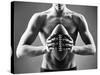 Close-Up of Topless Man Holding Rugby Ball in Isolation-pressmaster-Stretched Canvas