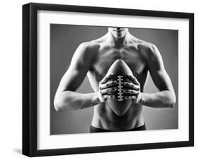 Close-Up of Topless Man Holding Rugby Ball in Isolation-pressmaster-Framed Photographic Print