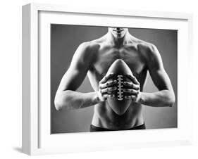 Close-Up of Topless Man Holding Rugby Ball in Isolation-pressmaster-Framed Photographic Print