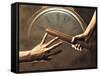 Close Up of Two Runners Hands Passing the Baton in Relay Race in Front of Old European Clock Face-null-Framed Stretched Canvas