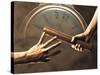 Close Up of Two Runners Hands Passing the Baton in Relay Race in Front of Old European Clock Face-null-Stretched Canvas