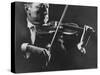 Close Up of Violinist Jascha Heifetz Playing in Mili's Darkened Studio-Gjon Mili-Stretched Canvas