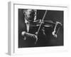 Close Up of Violinist Jascha Heifetz Playing in Mili's Darkened Studio-Gjon Mili-Framed Premium Photographic Print