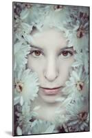 Close Up of Young Girls Face in Flowers-Carolina Hernandez-Mounted Photographic Print