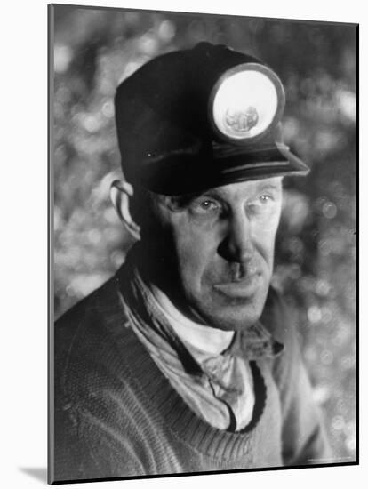 Close Up of Young Mining Foreman of English Descent in Tunnel of the Powderly Anthracite Coal Mine-Margaret Bourke-White-Mounted Photographic Print