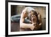 Close up of Young Woman Practicing Yoga, Sitting in Head to Knee Forward Bend Exercise, Janu Sirsas-fizkes-Framed Photographic Print