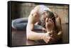 Close up of Young Woman Practicing Yoga, Sitting in Head to Knee Forward Bend Exercise, Janu Sirsas-fizkes-Framed Stretched Canvas