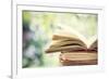 Close up on Old Book on Colorful Bokeh Background-melis-Framed Photographic Print