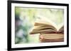 Close up on Old Book on Colorful Bokeh Background-melis-Framed Photographic Print