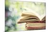 Close up on Old Book on Colorful Bokeh Background-melis-Mounted Photographic Print