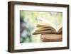 Close up on Old Book on Colorful Bokeh Background-melis-Framed Photographic Print