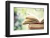 Close up on Old Book on Colorful Bokeh Background-melis-Framed Photographic Print