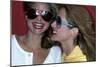 Close-Up on Two Models with Smiles, a Pair of Red Plastic Bon-Lon Sunglasses by Bonneau-Jacques Malignon-Mounted Premium Giclee Print
