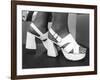 Close-Up Photograph of Feet in a Pair of White Platform Sandals-null-Framed Photographic Print