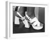 Close-Up Photograph of Feet in a Pair of White Platform Sandals-null-Framed Photographic Print